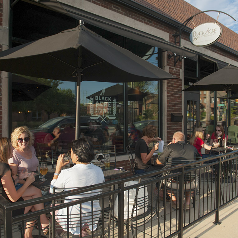 Exterior people eating and drinking at Black Acre Brewing Company in Irvington