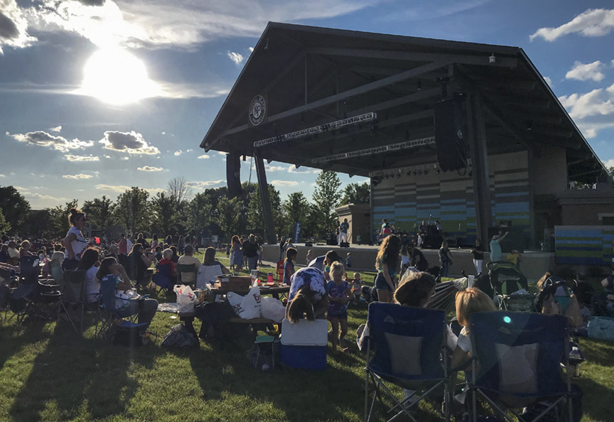A crowd enjoys a concert on the lawn at the Nickel Plate Amphitheater in Fishers 