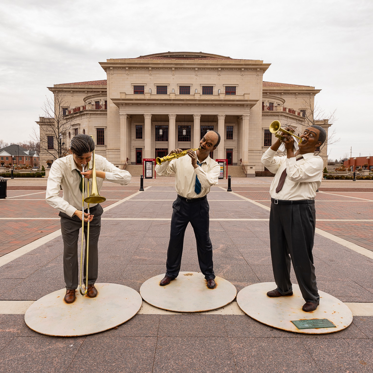 Exterior of The Palladium with Jazz Musician Statues in the foreground