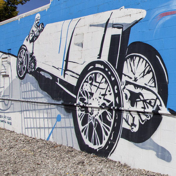 Mural of an old race car in Speedway