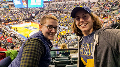 Two Michigan Wolverine fans at March Madness basketball game