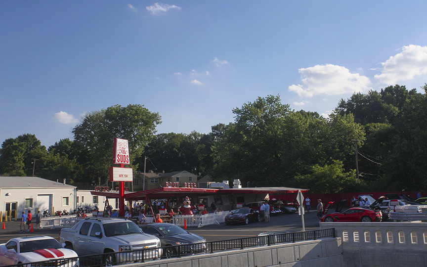 Cars gathered at The Suds Drive-in diner