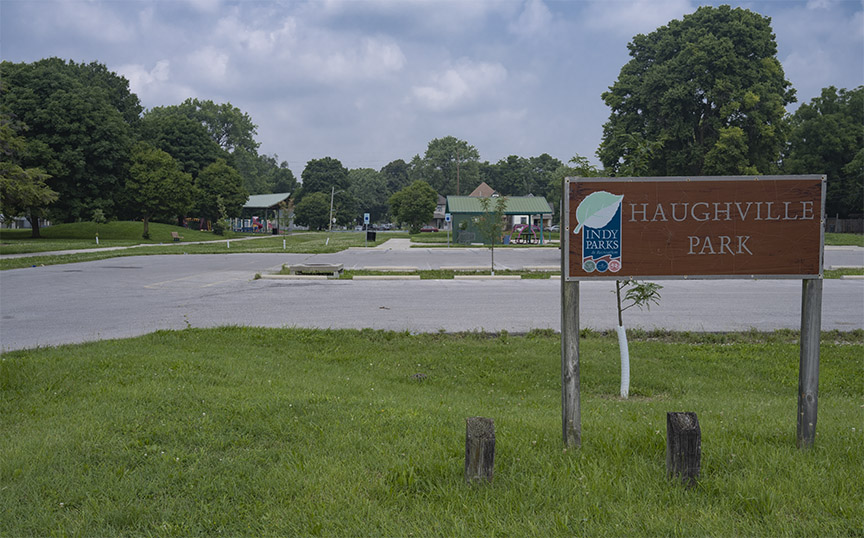 Haughville Park sign with the park in the background