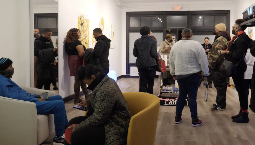 Guests exploring the 1000 Words art gallery