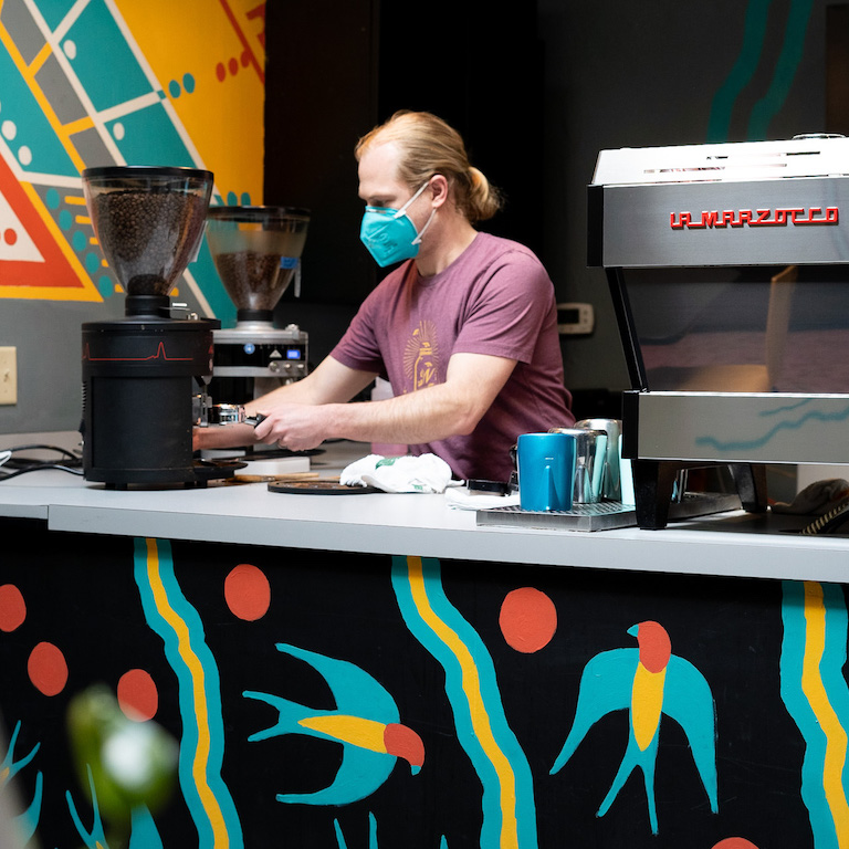 Barista working at Calvin Fletcher's Coffee Company