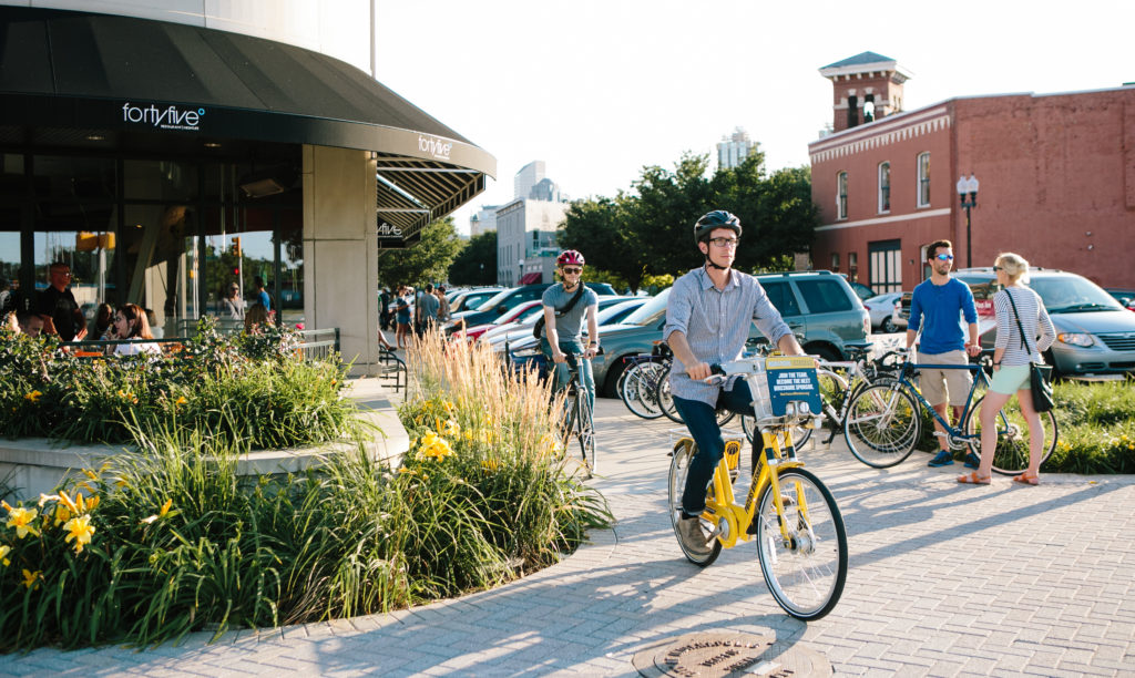 People cycling on Indiana Pacers Bikeshare bikes