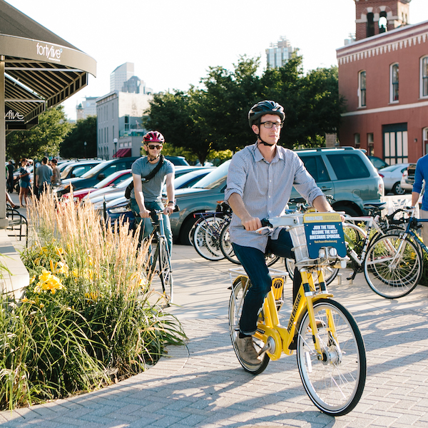 People cycling on Indiana Pacers Bikeshare bikes
