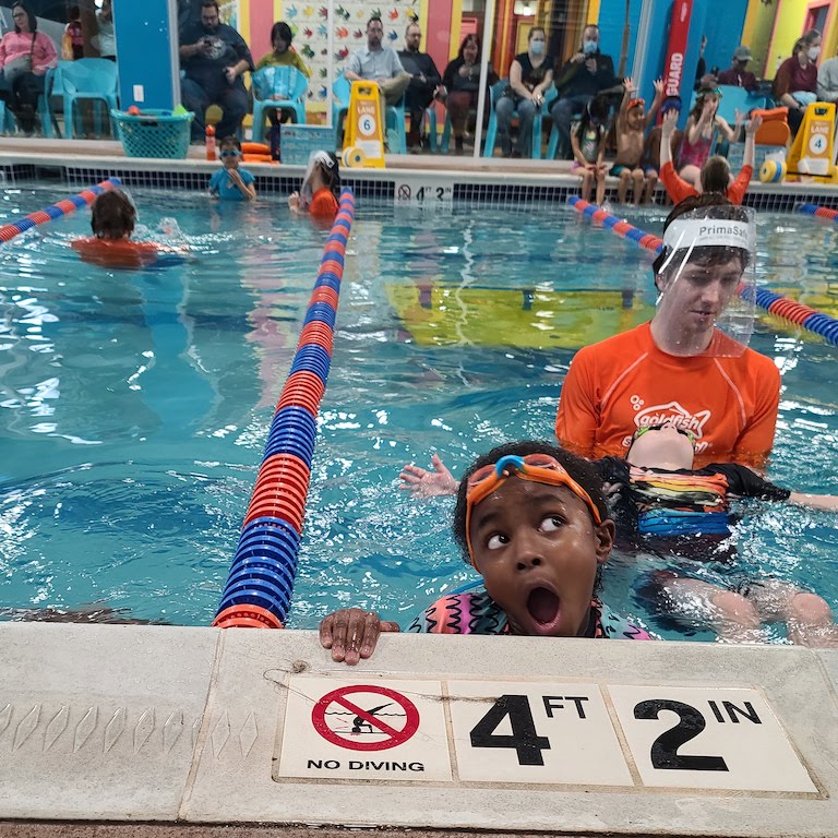 Children learning to swim at Goldfish Swim School