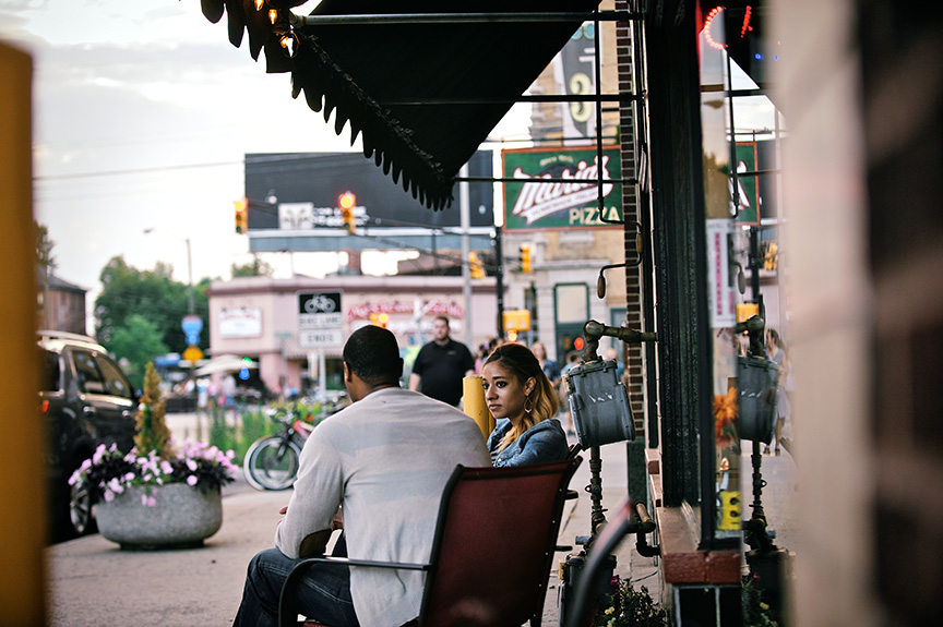 Couple sitting outside in an urban environment