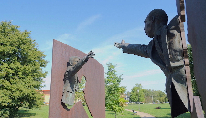 Memorial in Indianapolis Indiana showing Robert Kennedy reaching out to Martin Luther King Jr.