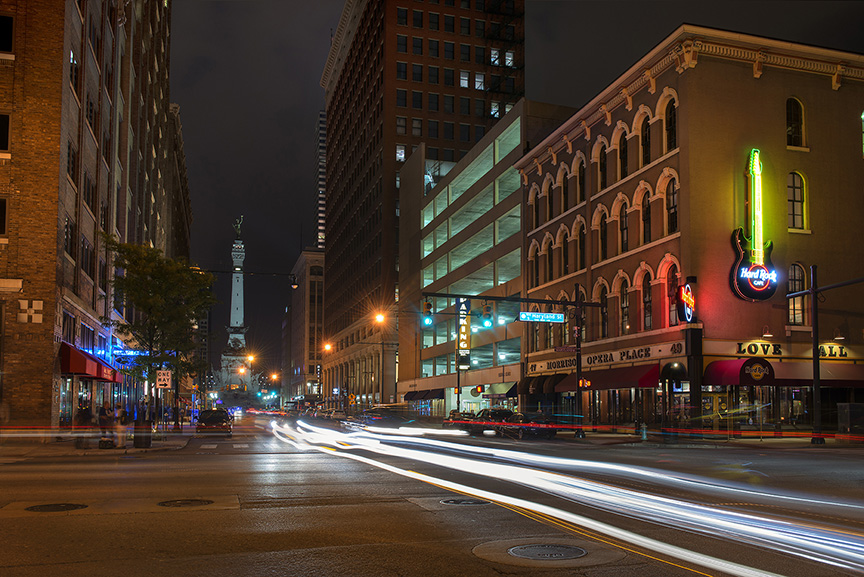 Evening shot of car light streaks with Monument Circle in the background