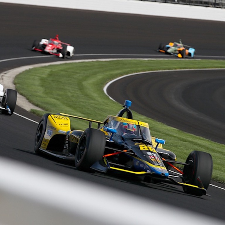 IndyCar Drivers racing at the Indianapolis Motor Speedway