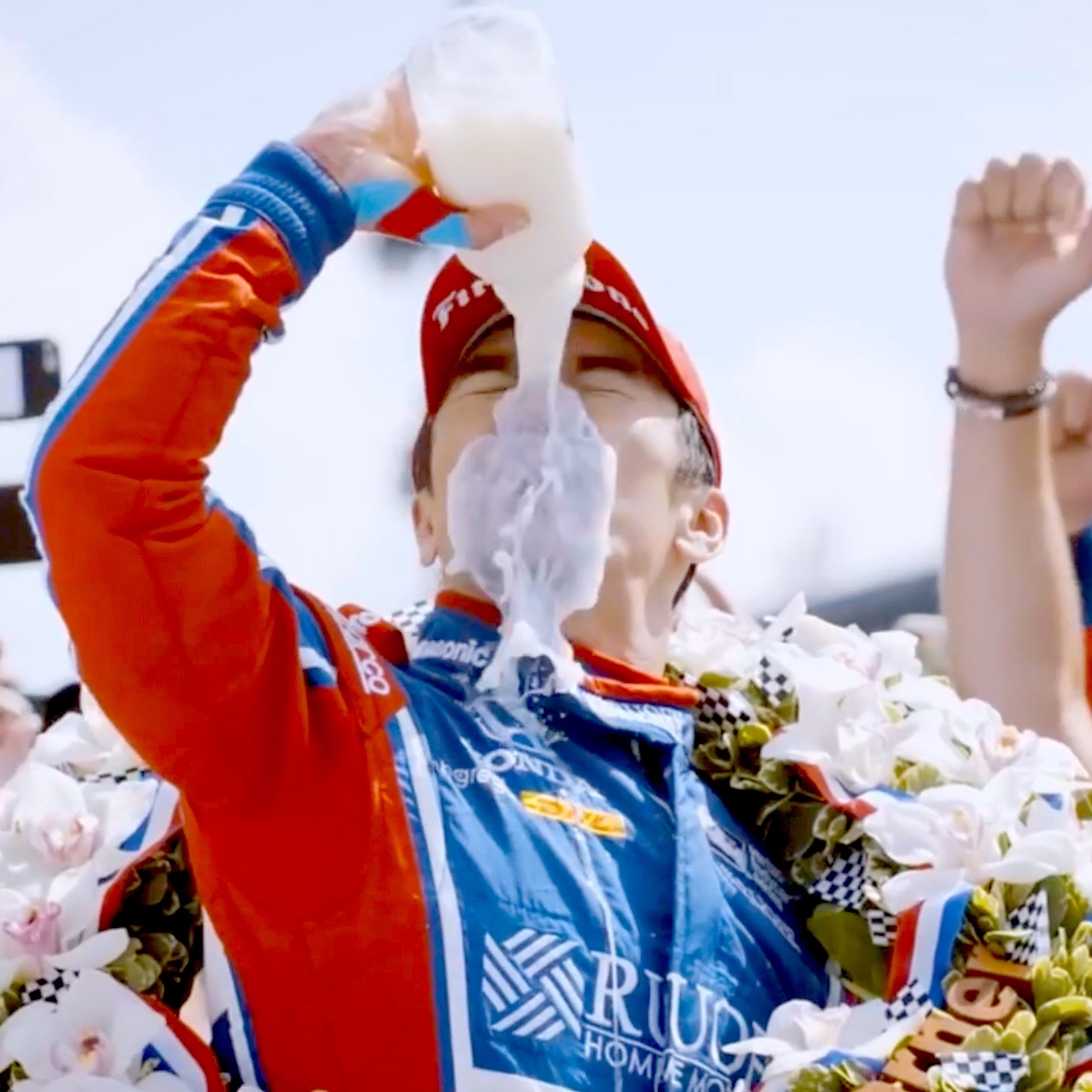 Takuma Sato drinks the milk after winning the Indy 500