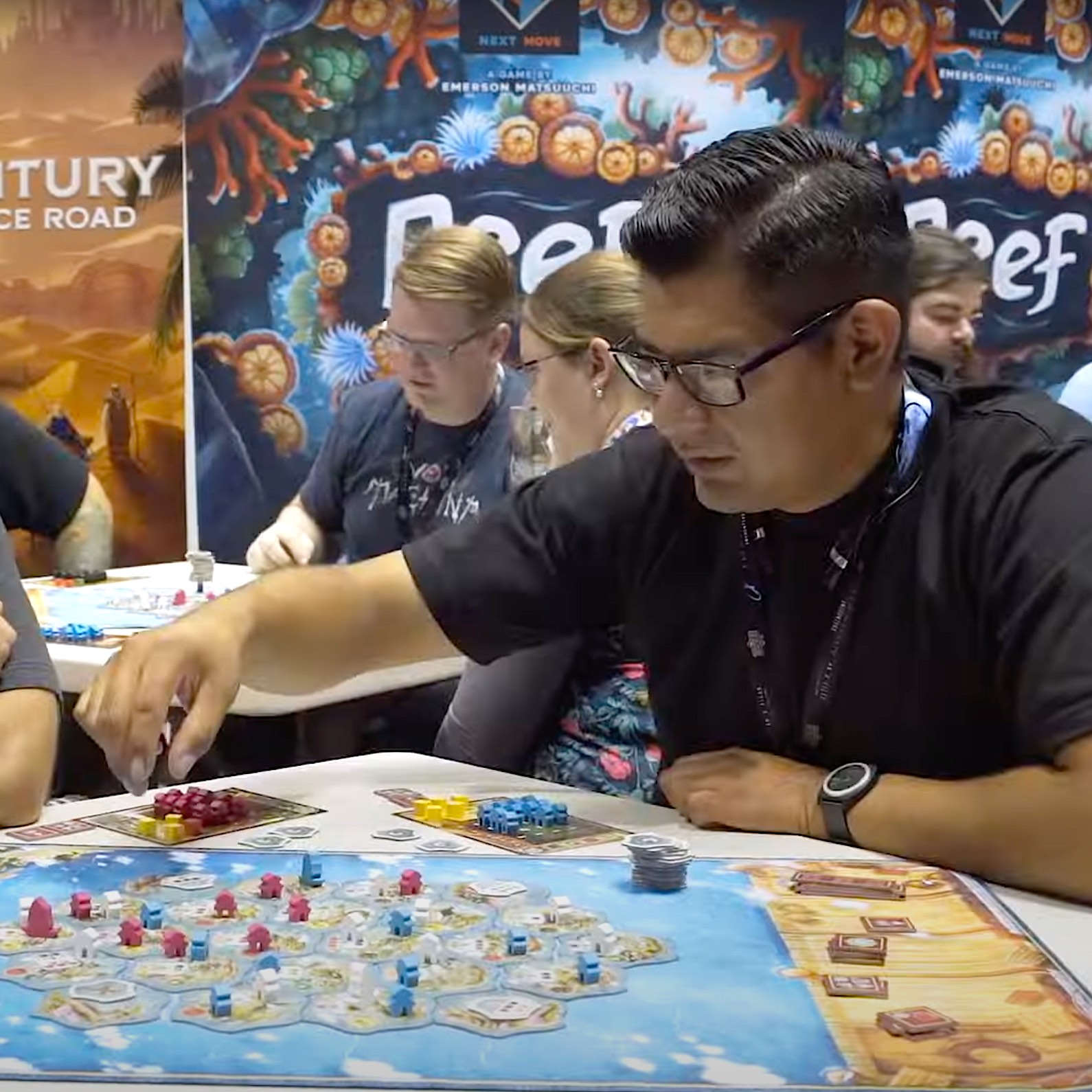 Person Playing Board Game at Gen Con