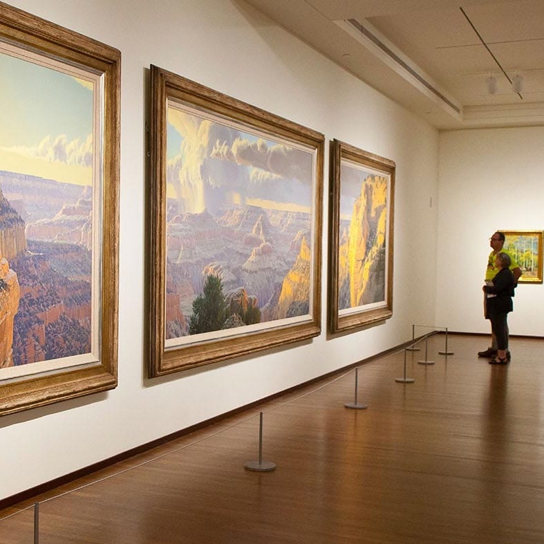 People admiring art at the Eiteljorg Museum