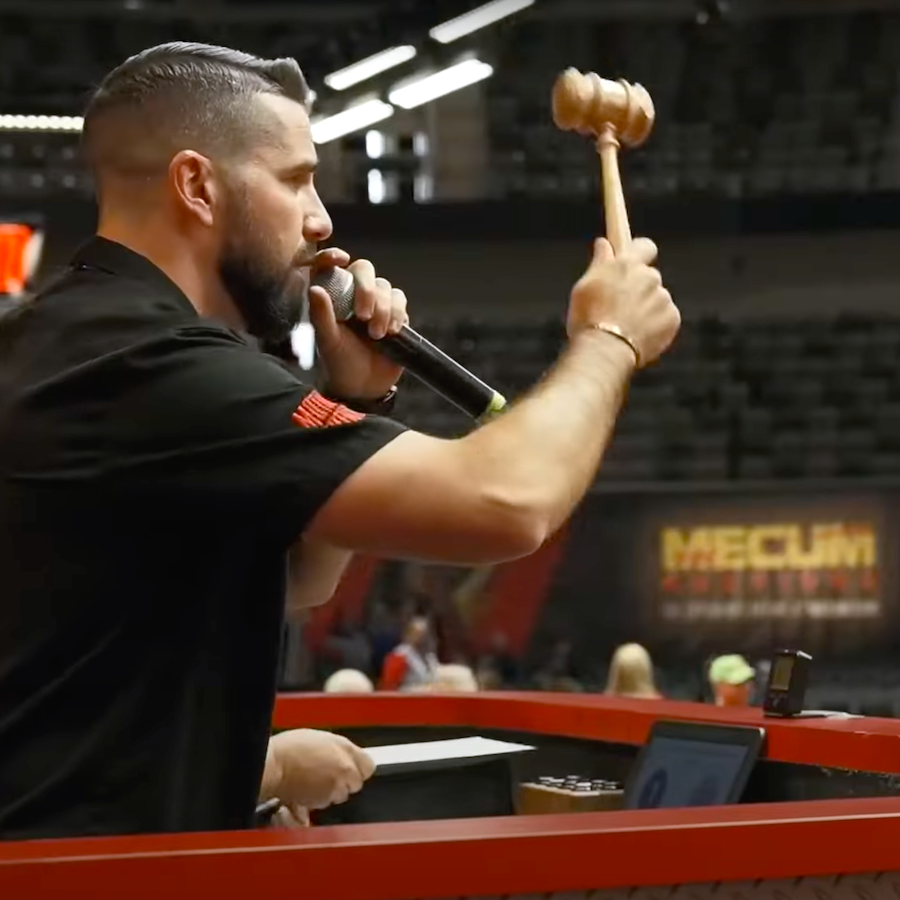 Auctioneer at the Mecum Auto Auction in Indy