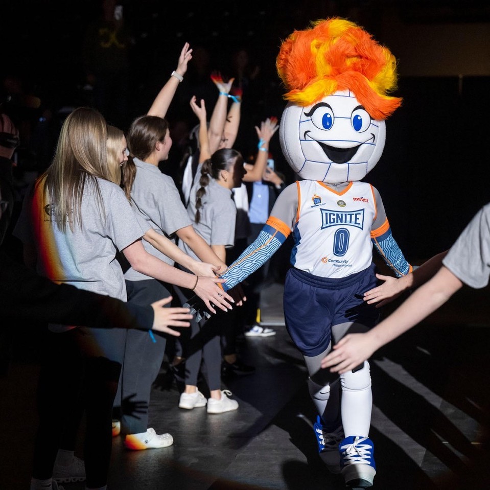 Indy Ignite Mascot giving high fives