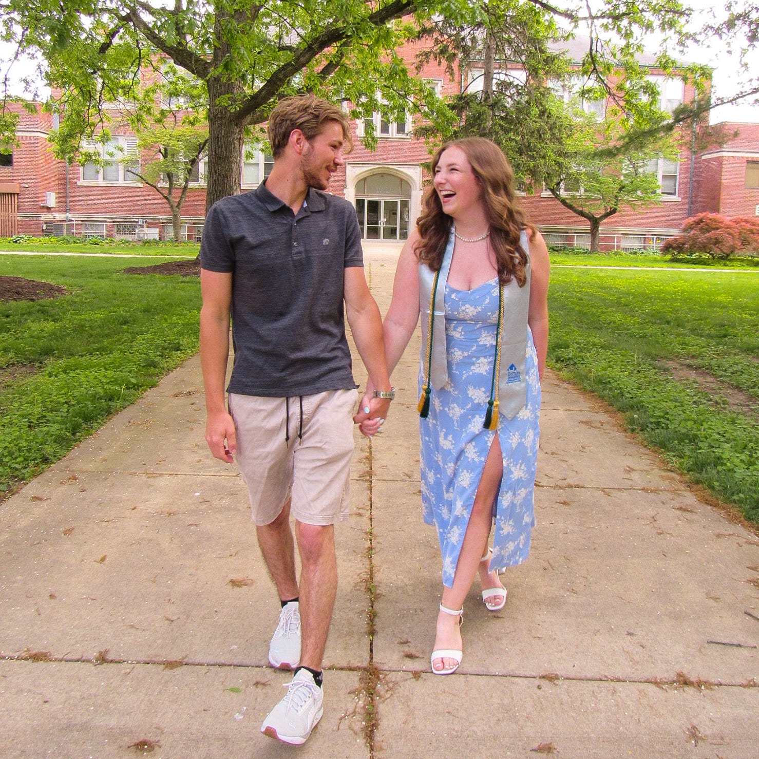 Haley Hoagland Post-Graduation Haley walking with her boyfriend on graduation day